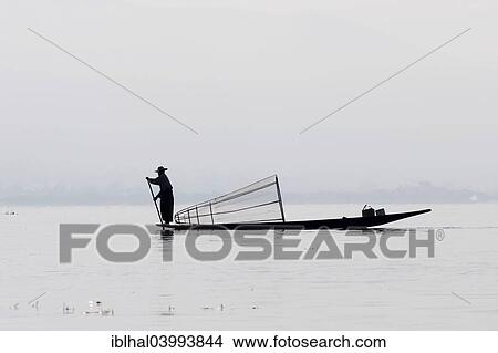"Fisherman, leg rower, on a boat on Inle Lake, Shan State, Myanmar, Asia" View Large Photo Image Picture - "Fisherman, leg rower, on a boat on Inle Lake, Shan State, Myanmar, Asia". Fotosearch