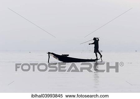 "Fisherman, leg rower, on a boat on Inle Lake, Shan State, Myanmar, Asia" View Large Photo Image Stock Photography - "Fisherman, leg rower, on a boat on Inle Lake, Shan State, Myanmar, Asia". Fotosearch