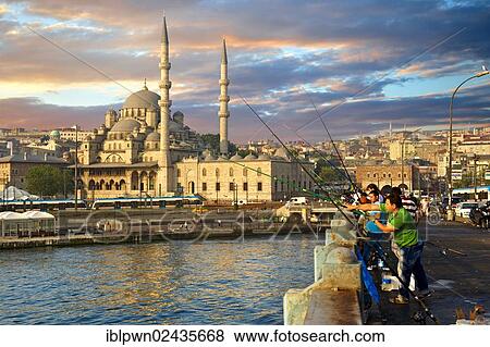 "Fisherman on the Galata bridge fishing in the Golden Horn next to The Yeni Camii, The New Mosque or Mosque of the Valide Sultan, ordered by Safiye Sultan in 1597, Istanbul, Turkey, Europe, Asia" View Large Photo Image Stock Photo - "Fisherman on the Galata bridge fishing in the Golden Horn next to The Yeni Camii, The New Mosque or Mosque of the Valide Sultan, ordered by Safiye Sultan in 1597, Istanbul, Turkey, Europe, Asia". Fotosearch