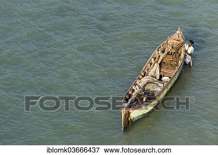 "Fisherman with his fishing boat, Rameswaram, Pamban Island, Tamil Nadu, India, Asia" View Large Photo Image Stock Photo - "Fisherman with his fishing boat, Rameswaram, Pamban Island, Tamil Nadu, India, Asia". Fotosearch