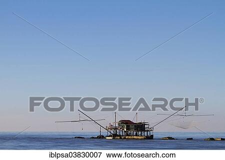 "Fisherman's house with nets over the sea in Marina di Pisa, Tuscany, Italy, Europe" View Large Photo Image Stock Photo - "Fisherman's house with nets over the sea in Marina di Pisa, Tuscany, Italy, Europe". Fotosearch