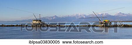 "Fisherman's houses with nets over the sea in Marina di Pisa, Tuscany, Italy, Europe" View Large Photo Image Stock Photography - "Fisherman's houses with nets over the sea in Marina di Pisa, Tuscany, Italy, Europe". Fotosearch