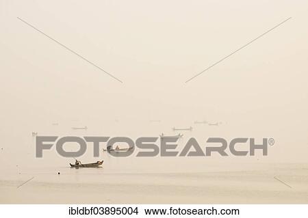 "Fishermen in their boats in the morning light, Thaungthaman Lake, Amarapura, Mandalay Division, Myanmar, Asia" View Large Photo Image Picture - "Fishermen in their boats in the morning light, Thaungthaman Lake, Amarapura, Mandalay Division, Myanmar, Asia". Fotosearch