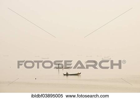 "Fishermen in their boats in the morning light, Thaungthaman Lake, Amarapura, Mandalay Division, Myanmar, Asia" View Large Photo Image Stock Photography - "Fishermen in their boats in the morning light, Thaungthaman Lake, Amarapura, Mandalay Division, Myanmar, Asia". Fotosearch