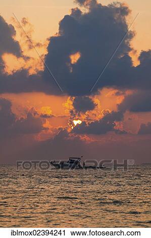 "Fishing boat at dusk, North Male Atoll, Republic of Maldives, Indian Ocean, Asia" View Large Photo Image Stock Image - "Fishing boat at dusk, North Male Atoll, Republic of Maldives, Indian Ocean, Asia". Fotosearch