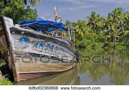 Stock Photo - "Fishing boat, backwaters, Kerala, India, Asia". Fotosearch