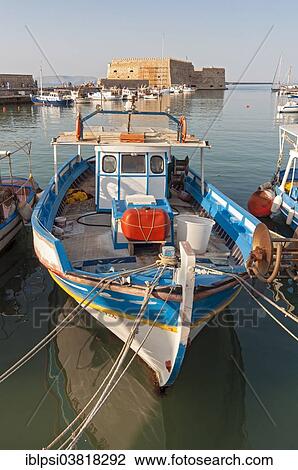 "Fishing boat in front of Koules Fortress or Rocca al Mare, Old Port of Heraklion, Crete, Greece, Europe" View Large Photo Image Stock Image - "Fishing boat in front of Koules Fortress or Rocca al Mare, Old Port of Heraklion, Crete, Greece, Europe". Fotosearch