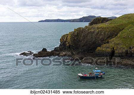 "Fishing boat in the bay of the port of Abercastle, Pembrokeshire, Wales, United Kingdom, Europe" View Large Photo Image Stock Photography - "Fishing boat in the bay of the port of Abercastle, Pembrokeshire, Wales, United Kingdom, Europe". Fotosearch