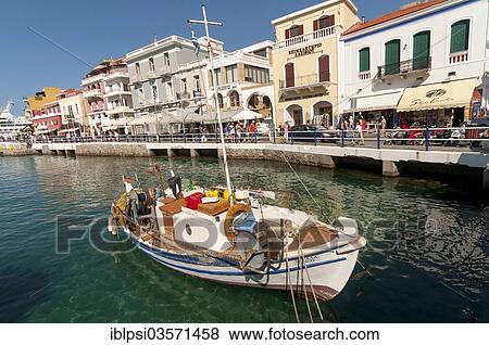 "Fishing boat in the harbour, Agios Nikolaos, Crete, Greece, Europe" View Large Photo Image Stock Photo - "Fishing boat in the harbour, Agios Nikolaos, Crete, Greece, Europe". Fotosearch