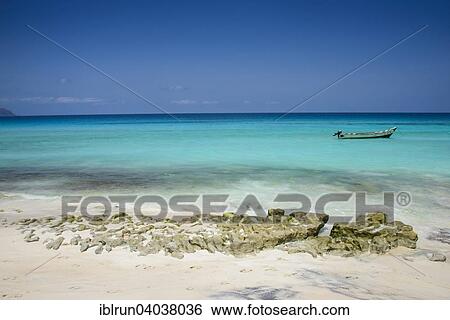 "Fishing boat in the turquoise waters in Shuab Bay, island of Socotra, Yemen, Asia" View Large Photo Image Stock Photograph - "Fishing boat in the turquoise waters in Shuab Bay, island of Socotra, Yemen, Asia". Fotosearch