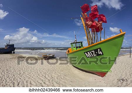 "Fishing boat on the beach, Mistroy, Wolin peninsula, Poland, Europe" View Large Photo Image Stock Photograph - "Fishing boat on the beach, Mistroy, Wolin peninsula, Poland, Europe". Fotosearch