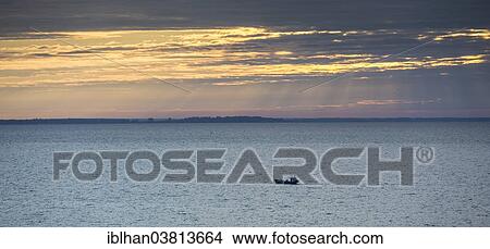 "Fishing boat on the Curonian Lagoon at sunrise, Nida, KlaipÄ—da County, Lithuania, Europe" View Large Photo Image Picture - "Fishing boat on the Curonian Lagoon at sunrise, Nida, KlaipÄ—da County, Lithuania, Europe". Fotosearch