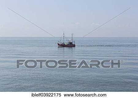 Fishing boat on the North Sea View Large Photo Image Stock Photography - Fishing boat on the North Sea. Fotosearch