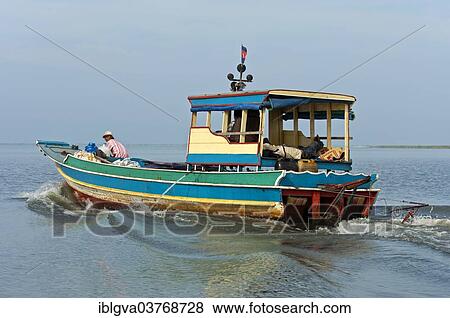 "Fishing boat on the Tonle Sap lake, Cambodia, Asia" View Large Photo Image Stock Photo - "Fishing boat on the Tonle Sap lake, Cambodia, Asia". Fotosearch