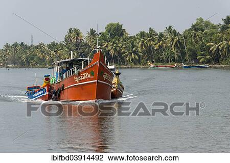 "Fishing boat, typical landscape with palm trees, Kerala Backwaters, Alappuzha, Kerala, India, Asia" View Large Photo Image Stock Image - "Fishing boat, typical landscape with palm trees, Kerala Backwaters, Alappuzha, Kerala, India, Asia". Fotosearch