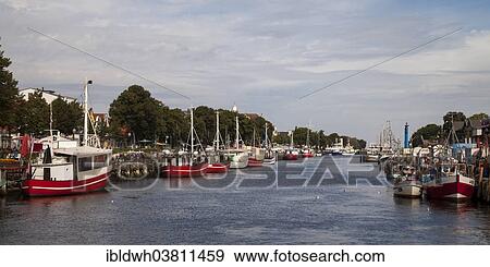 "Fishing boats at the Unterwarnow Estuary, harbour, Warnemunde, Rostock, Mecklenburg-Western Pomerania, Germany, Europe" View Large Photo Image Stock Photo - "Fishing boats at the Unterwarnow Estuary, harbour, Warnemunde, Rostock, Mecklenburg-Western Pomerania, Germany, Europe". Fotosearch