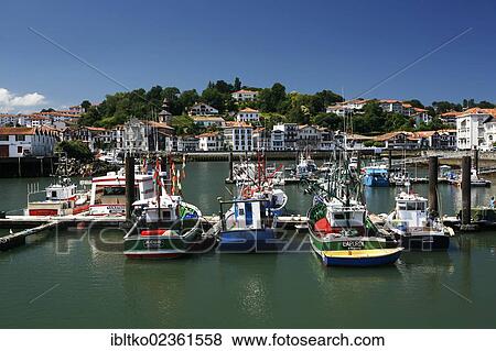 Stock Photo - "Fishing boats, fishing port of Saint-Jean-de-Luz, in Basque: Donibane Lohizune, Pyrenees, Aquitaine region, Pyrenees-Atlantiques department, France, Europe". Fotosearch