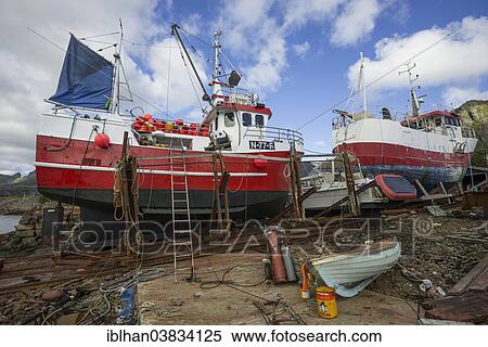 "Fishing boats in a dry dock, sound, Lofoten, Nordland, Norway, Europe" View Large Photo Image Stock Photography - "Fishing boats in a dry dock, sound, Lofoten, Nordland, Norway, Europe". Fotosearch