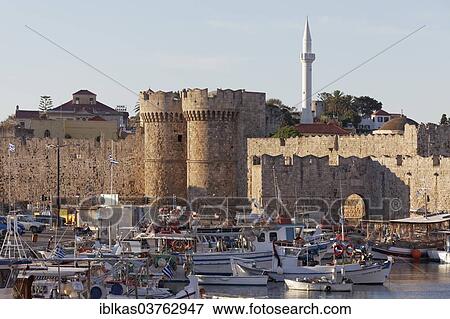 "Fishing boats in front of the Marine Gate, Rhodes, Rhodes island, Dodecanese, Greece, Europe" View Large Photo Image Stock Photo - "Fishing boats in front of the Marine Gate, Rhodes, Rhodes island, Dodecanese, Greece, Europe". Fotosearch