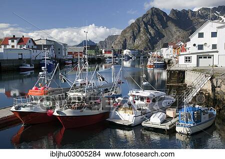 Picture - "Fishing boats in the harbor, Henningsvaer, Henningsvaer, Heimoya, Heimoya, Lofoten, Nordland, Northern Norway, Norway, Europe". Fotosearch