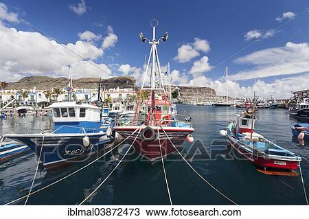 "Fishing boats in the harbor, Puerto de Mogan, Gran Canaria, Canary Islands, Spain, Europe" View Large Photo Image Stock Image - "Fishing boats in the harbor, Puerto de Mogan, Gran Canaria, Canary Islands, Spain, Europe". Fotosearch