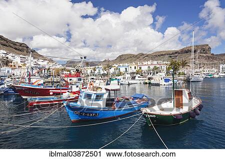 "Fishing boats in the harbor, Puerto de Mogan, Gran Canaria, Canary Islands, Spain, Europe" View Large Photo Image Stock Image - "Fishing boats in the harbor, Puerto de Mogan, Gran Canaria, Canary Islands, Spain, Europe". Fotosearch