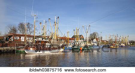 "Fishing boats in the harbor, Greetsiel, Leybucht, Krummhorn, East Frisia, Lower Saxony, Germany, Europe" View Large Photo Image Stock Photograph - "Fishing boats in the harbor, Greetsiel, Leybucht, Krummhorn, East Frisia, Lower Saxony, Germany, Europe". Fotosearch