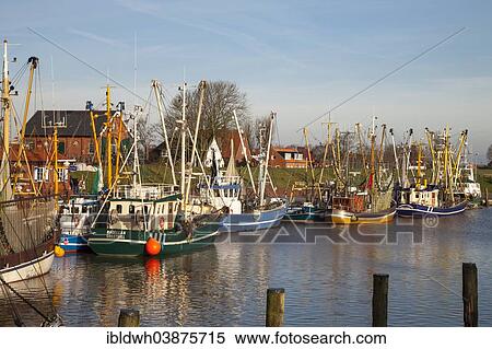 "Fishing boats in the harbor, Greetsiel, Leybucht, Krummhorn, East Frisia, Lower Saxony, Germany, Europe" View Large Photo Image Stock Photography - "Fishing boats in the harbor, Greetsiel, Leybucht, Krummhorn, East Frisia, Lower Saxony, Germany, Europe". Fotosearch