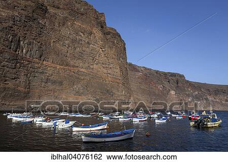 "Fishing boats in the harbour of Vueltas, Valle Gran Rey, La Gomera, Canary Islands, Spain, Europe" View Large Photo Image Stock Image - "Fishing boats in the harbour of Vueltas, Valle Gran Rey, La Gomera, Canary Islands, Spain, Europe". Fotosearch