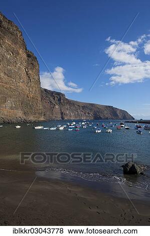 "Fishing boats in the harbour of Vueltas, Valle Gran Rey, La Gomera, Canary Islands, Spain, Europe" View Large Photo Image Stock Photo - "Fishing boats in the harbour of Vueltas, Valle Gran Rey, La Gomera, Canary Islands, Spain, Europe". Fotosearch