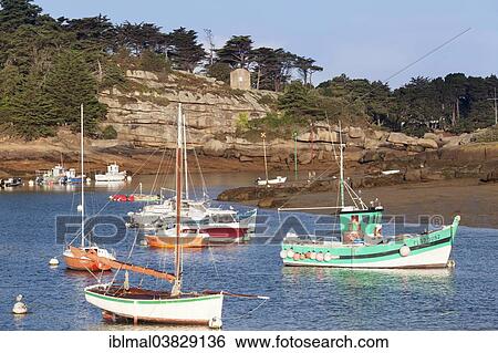 "Fishing boats in the harbour of Ploumanach, Cote de Granit Rose, Cotes d’Armor, Brittany, France, Europe" View Large Photo Image Stock Photograph - "Fishing boats in the harbour of Ploumanach, Cote de Granit Rose, Cotes d’Armor, Brittany, France, Europe". Fotosearch