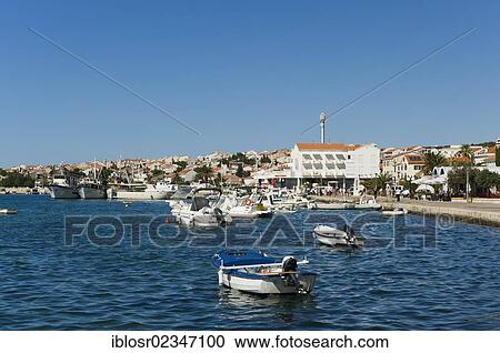 Stock Image - "Fishing boats in the harbour of the town of Novalja, Pag Island, Adriatic Sea, Gulf of Kvarner, Croatia, Europe". Fotosearch