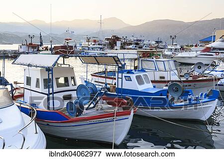 "Fishing boats in the harbour, Karpathos, Dodecanese, South Aegean, Greece, Europe" View Large Photo Image Stock Photo - "Fishing boats in the harbour, Karpathos, Dodecanese, South Aegean, Greece, Europe". Fotosearch