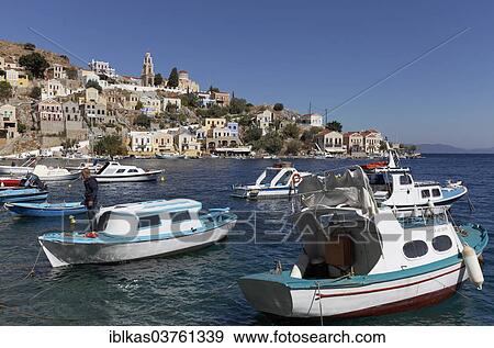 "Fishing boats in the harbour, Symi, Symi island, Dodecanese, Greece, Europe" View Large Photo Image Stock Photo - "Fishing boats in the harbour, Symi, Symi island, Dodecanese, Greece, Europe". Fotosearch