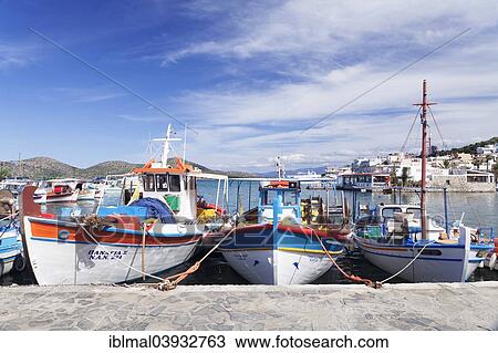 Stock Image - "Fishing boats in the port of Elounda, Mirabello Gulf, East Crete, Crete, Greece, Europe". Fotosearch