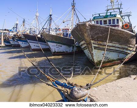 "Fishing boats in the port of Essaouira, Unesco World Heritage Site, Morocco, Africa" View Large Photo Image Stock Image - "Fishing boats in the port of Essaouira, Unesco World Heritage Site, Morocco, Africa". Fotosearch