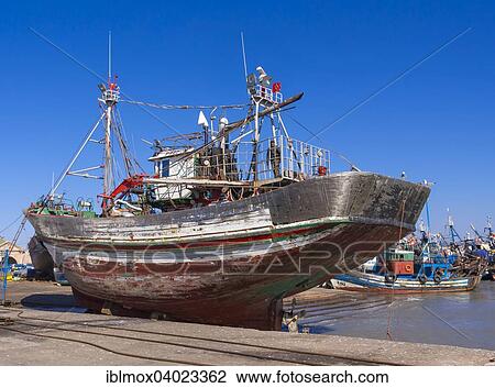 "Fishing boats in the port of Essaouira, Unesco World Heritage Site, Morocco, Africa" View Large Photo Image Stock Image - "Fishing boats in the port of Essaouira, Unesco World Heritage Site, Morocco, Africa". Fotosearch