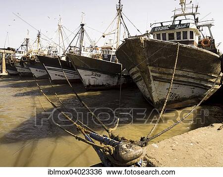 "Fishing boats in the port of Essaouira, Unesco World Heritage Site, Morocco, Africa" View Large Photo Image Stock Photograph - "Fishing boats in the port of Essaouira, Unesco World Heritage Site, Morocco, Africa". Fotosearch