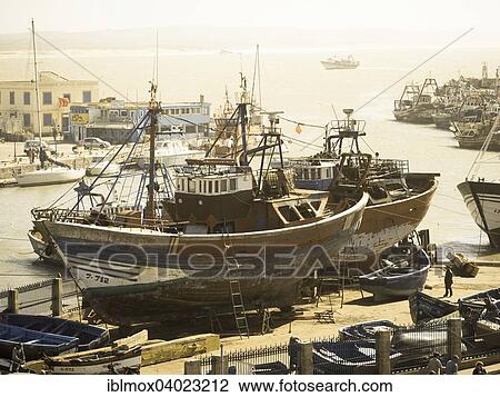 "Fishing boats in the yard, port of Essaouira, Unesco World Heritage Site, Morocco, Africa" View Large Photo Image Stock Image - "Fishing boats in the yard, port of Essaouira, Unesco World Heritage Site, Morocco, Africa". Fotosearch
