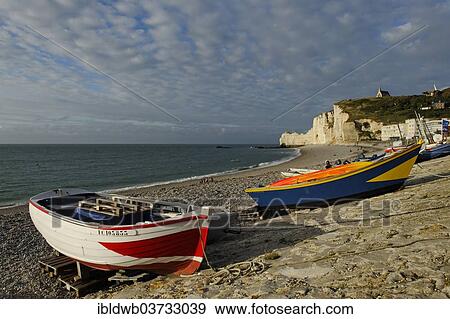 "Fishing boats on a beach with white cliffs, Etretat, Departement Seine-Maritime, Upper Normandy, France, Europe" View Large Photo Image Stock Photo - "Fishing boats on a beach with white cliffs, Etretat, Departement Seine-Maritime, Upper Normandy, France, Europe". Fotosearch