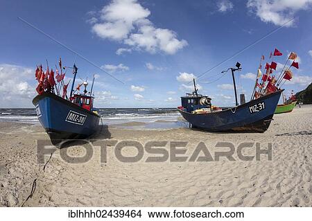 "Fishing boats on the beach, Mistroy, Wolin peninsula, Poland, Europe" View Large Photo Image Picture - "Fishing boats on the beach, Mistroy, Wolin peninsula, Poland, Europe". Fotosearch
