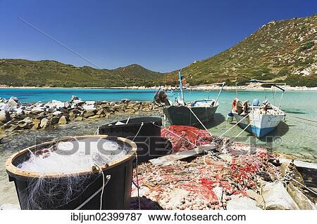 "Fishing boats on the beach of Punta Molentis, Villasimius, Sarrabus, Cagliari province, Sardinia, Italy, Europe" View Large Photo Image Stock Photo - "Fishing boats on the beach of Punta Molentis, Villasimius, Sarrabus, Cagliari province, Sardinia, Italy, Europe". Fotosearch