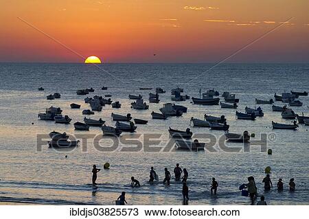 "Fishing boats on the ocean at sunset, Cadiz, Andalusia, Spain, Europe" View Large Photo Image Stock Image - "Fishing boats on the ocean at sunset, Cadiz, Andalusia, Spain, Europe". Fotosearch