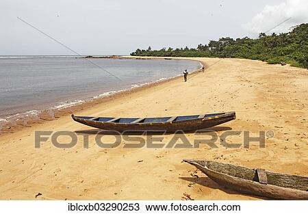 "Fishing boats or pirogues on the beach, Kribi, South Region, Cameroon, Africa" View Large Photo Image Stock Image - "Fishing boats or pirogues on the beach, Kribi, South Region, Cameroon, Africa". Fotosearch