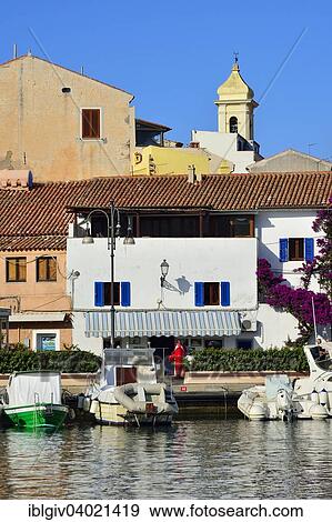 Stock Photo - "Fishing port and church of La Maddalena, National Park La Maddalena archipelago, Sardinia, Italy, Europe". Fotosearch