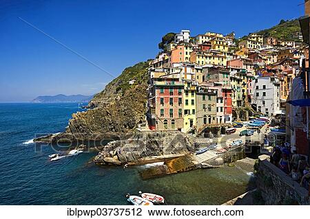 Stock Image - "Fishing port of Riomaggiore, Riomaggiore, Cinque Terre, Liguria, Italy, Europe". Fotosearch