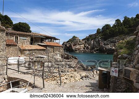 "Fishing village and hidden cove of Cala Deia, Deia, Serra de Tramuntana, northwest coast, Mallorca, Balearic Islands, Mediterranean Sea, Spain, Europe" View Large Photo Image Picture - "Fishing village and hidden cove of Cala Deia, Deia, Serra de Tramuntana, northwest coast, Mallorca, Balearic Islands, Mediterranean Sea, Spain, Europe". Fotosearch