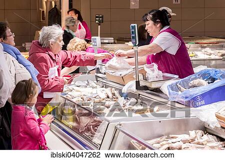Stock Image - "Fishmonger's stall in the market hall, Riga Central Market, Riga, Latvia, Europe". Fotosearch