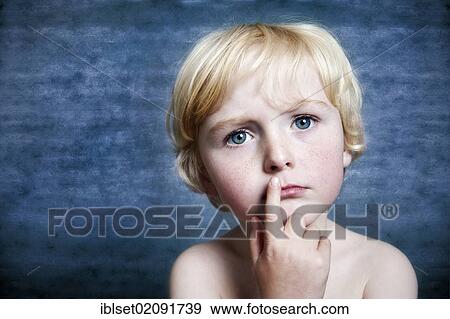 "Five-year-old boy pensively putting his finger to his mouth, portrait" View Large Photo Image Stock Photo - "Five-year-old boy pensively putting his finger to his mouth, portrait". Fotosearch