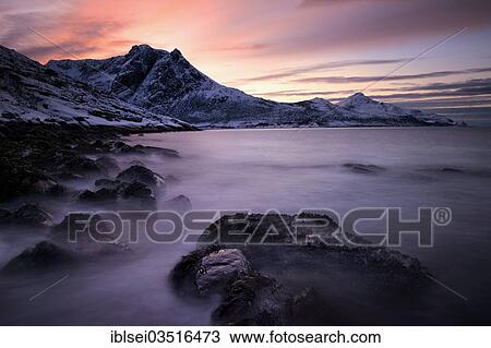 "Fjord with mountain range in the evening light in winter, Grotfjord, Tromso, ‪Troms, Northern Norway, Norway, Europe" View Large Photo Image Stock Image - "Fjord with mountain range in the evening light in winter, Grotfjord, Tromso, ‪Troms, Northern Norway, Norway, Europe". Fotosearch